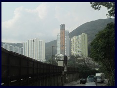 Repulse Bay in Southern district, Hong Kong. The curved 26-storey postmodern highrise building is called "The Lily" and was designed by Norman Foster. It is situated between Stanley, Deepwater Bay and Aberdeen, and is one of the most expensive housing area in HK.