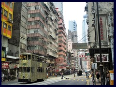 Typical double decked tram towards Central on Des Voeux Road, Sheung Wan.