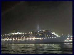 Cruise ship Arcadia in Kowloon's harbour. Note the light display from the mega scraper ICC in the background!