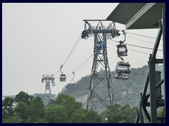 Cable cars brings tourists from Tung Chung on Lantau Island to the Great Buddha Statue. The tickets are very expensive.