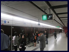 The subway stations have automatic glass doors that prevent people from falling down on the track.