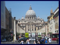 Via della Conciliazione is the avenue that leads towards the Vatican City from the Prati district. The exterior of St Peter's Basilica is visible from here.