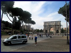 Between Arch of Titus and Colosseum
