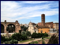View from Forum Romanum. To the right is Santa Francesca Romana (Santa Maria Nova),  a church built in the 900s, just next to the Roman Forum. To the left are the ruins of The Basilica of Maxentius and Constantine.