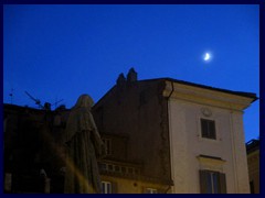 Campo de Fiori with Giordano Bruno, a philosopher who was put to death here in the year 1600, and the moon.