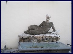 Il Babuino on Via del Babuino is one of Rome's so called "talking statues", where political messages can be written, and the street was named after it. It is situated next to a restaurant and is an ancient depiction of Silenus, half man, half goat.