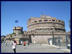 Castel Sant'Angelo (Castle of the Holy Angel) is a huge ancient fortress in cylindrical shape (built 139A.D.) near the Vatican, built as a mausoleum for Emperor Hadrian. It is also a building where the pope can escape through it's passages connected to the Vatican City. It is situated on the West banks of the river Tiber, connected to the old city center by Ponte Sant'Angelo, a bridge with beautiful religious sculptures.
