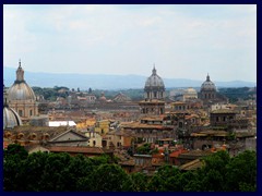 Rome panorama seen from Castel Sant'Angelo. Rome's ancient skyline is still very well preserved with it's church towers and monuments. The white structure to the left is the National Monument to Victor Emanuele II. The church to the left is Sant'Agnese in Agone at Piazza Navona. In front of it is San Salvatore in Lauro.