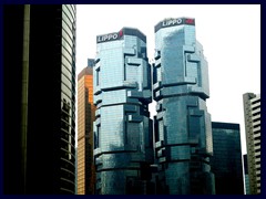 Lippo Towers from 1988. Originally built by an Australian, the glass towers are designed to resembles koalas climbing on the walls. The tallest tower is 186m tall.