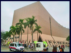 Cultural Center, situated between Salisbury Road and Victoria Harbour, opened in 1989 by Prince Charles and Princess Diana, at the site of the former Kowloon Station, a historic railway station that where torn down. Only the clock tower was preserved, a big controversy at the time. The Cultural Centre has a concert hall with over 2000 seats, two theatres, exhibition gallery and rehearsal rooms.