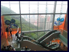 Escalators inside The Peak Tower that has incredible views over the city!