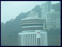 Hopewell Centre in Wan Chai, one of Hong Kong's older skyscrapers, tallest in HK 1980-90, and 2nd tallest in Asia at the moment of completion. It was built in 1980 and has 64 floors. This 216m tall skyscraper has glass enclosed elevators on the facade, and a rotating rooftop restaurant, as well as a rooftop swimming pool.