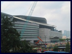 Hong Kong Convention and Exhibition Centre is situated on reclaimed land on the harbourfront of Wan Chai, opposite Kowloon. It is designed by famous  Skidmore, Owings & Merrill (who also designed Burj Khalifa) and it was completed in 1997. This huge building hosts more then 45 international fairs a year.