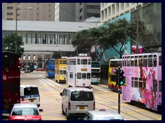 Double decked buses and trams on Des Voeux Road in Central district.