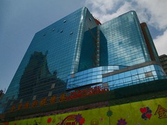 Paradise Kampek Casino is a only a casino, no hotel and is situated on the ground floor of this tall glass building.