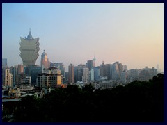 Macau skyline dominated by Grand Lisboa and Macau Tower.