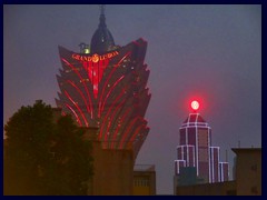 Grand Lisboa and Bank of China, changing neon colours.