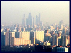 Moscow skyline from afar with the apartment "commie block" buildings in the front and the new CBD in the background, where you find some of Europe's tallest buildings, like the Federation Tower.