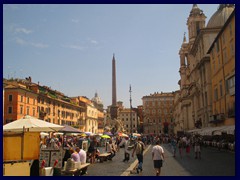 There are many artists at Piazza Navona. It is hard to believe that this picture was taken just after a heavy rain/thunderstorm.