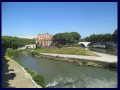 Isola Tiberina is a small island on river Tiber.