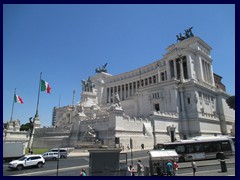 Monumento Nazionale a Vittorio Emanuele II (National Monument to Victor Emmanuel II) between  Piazza Venezia and Capitoline Hill is a beautiful white marble classicist building that is the national monument of Italy, built to honour the first king of Italy. 
It is sometimes called Altare della Patria (Altar of the Fatherland). It was built 1885-1925 and is the largest monument in Rome. Here you find Tomb of the Unknown Soldier under the statue of the godess Roma.
For a time Mussolini lived in the building. It has a height of 70m and is 135m. There are two observation decks on top, the highest is connected via glass elevator. 

It also houses a museum dedicated to the history of the unification of Italy, Museo Centrale Risorgimento, hasrenaissance paintings and temporary exibitions.
This eclectic renaissance structure was designed by Giuseppe Sacconi in 1885. A medieval area was destructed to make way for it.

The monument is not known to be beautiful by locals and has been given nicknames such as "typewriter" and "wedding cake", but personally I think it is very beatiful and one of the most impressive buildings in Rome.