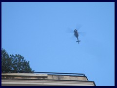 Police helicopter hovering above the demonstration on Via Cavour.