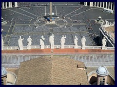 Piazza di San Pietro (St Peter's Square) from St Peter's Basilica, with sculptures of holy figures on the roof of the basilica.