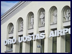 Vilnius Airport, Oro Uostas (airport in Lithuanian). The arrival terminal building was built in the 1950s Soviet in a mix of neo-classical and funkis style, decorated with aviaton workers. 