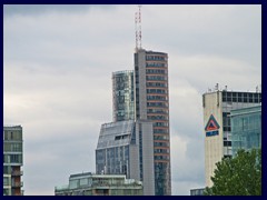 Skyline seen from Mindaugo Bridge: Europa Tower, Vilnius tallest skyscraper (129m to the roof) from 2004. In the front of it is Vilnius Municipal Center, also from 2004.